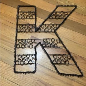 “K” black sign